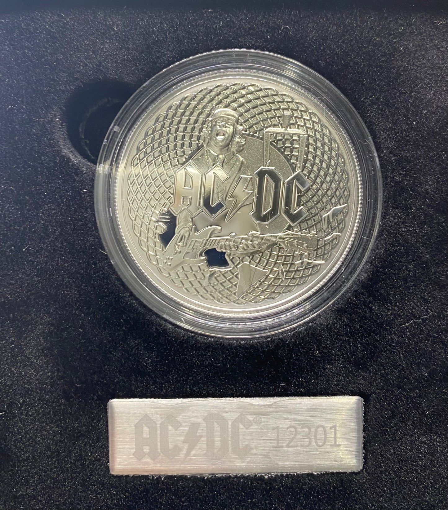 The 2023 AC/DC $1 Silver Frosted Uncirculated Coin is a tribute to the legendary Australian rock band AC/DC