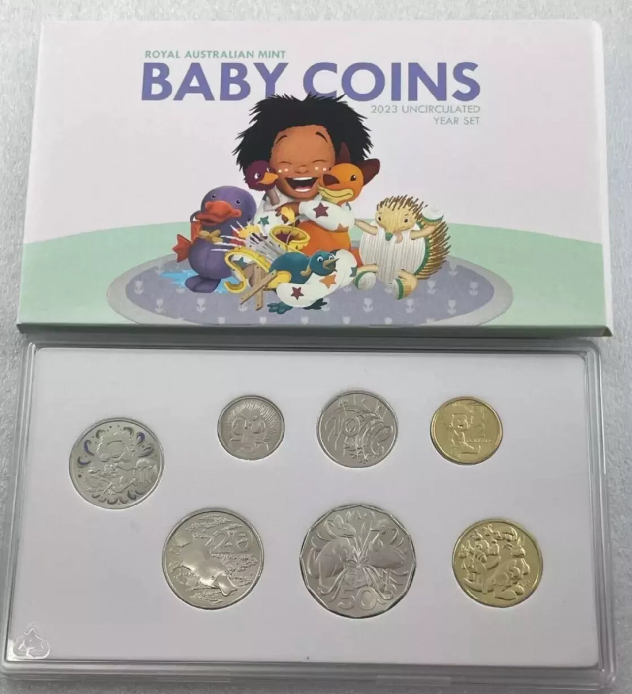 2023 baby Six coins in uncirculated (UNC) finish: 5 c, 10 c, 20 c, 50 c, $1, and $2—all dated 2023
